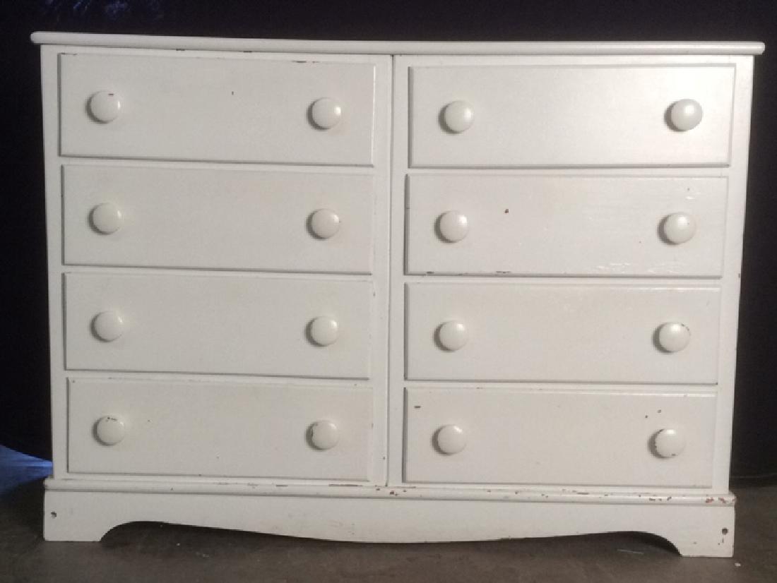 Wooden White Toned 8 Drawer Dresser: Dresser is white toned. Contains 8 drawers. Has knob style handles. Country Style White Wood Dresser, Dresser is wooden. Contains some paint wear and minor scratches. Measures approx 47 inches long 35