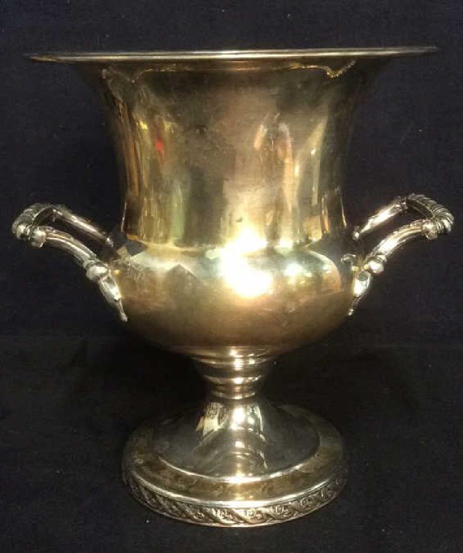 SPRING FLOWER WM RODGERS & SON Ice Bucket: Marked SPRING FLOWER WM RODGERS & SON on underside. Appears to be silver plated however has not been tested. Serveware. Contains silver tone. Piece is dual handled. Measures approx 9.5 inches tall 10