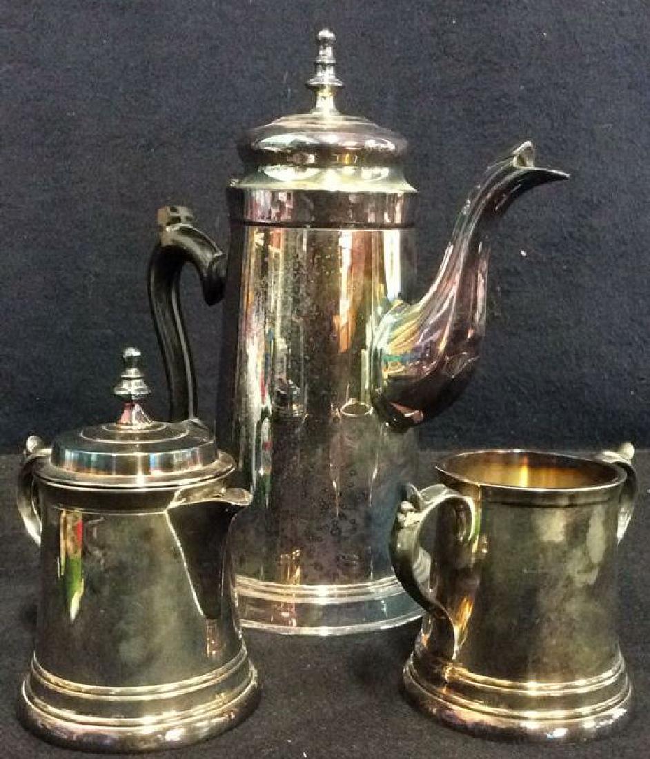 Lot 3 EALES 1779 Coffee Pot & More Service: Marked EALES 1779 INDIA E.P.M.S on underside. Includes coffee pot, lidded sugar and creamer. Lid fits on both sugar and creamer. All pieces appear to be silver plated. Coffee pot measures approx 10 in