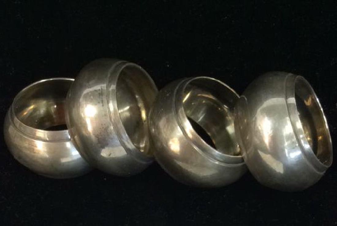 Set 4 Silver Toned Metal Napkin Ring Holders (1 of 5)