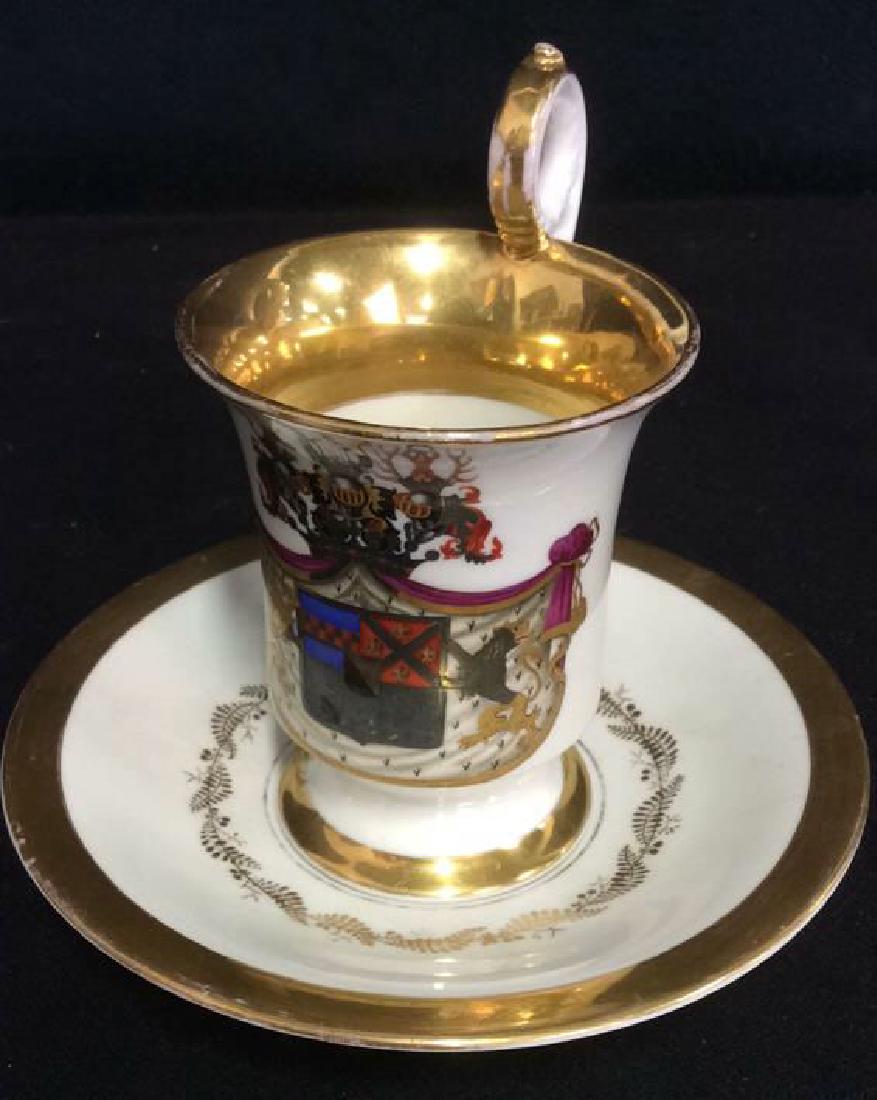 Antique KPM Marked Armorial Cup and Saucer: VIntage KPM Porcelain,gold rimmed cup gold rimmed saucer armor crest medallion , possibly early 1800,,s; pedestal footed cup ht app 5.5 inches saucer app 6 inch diameter