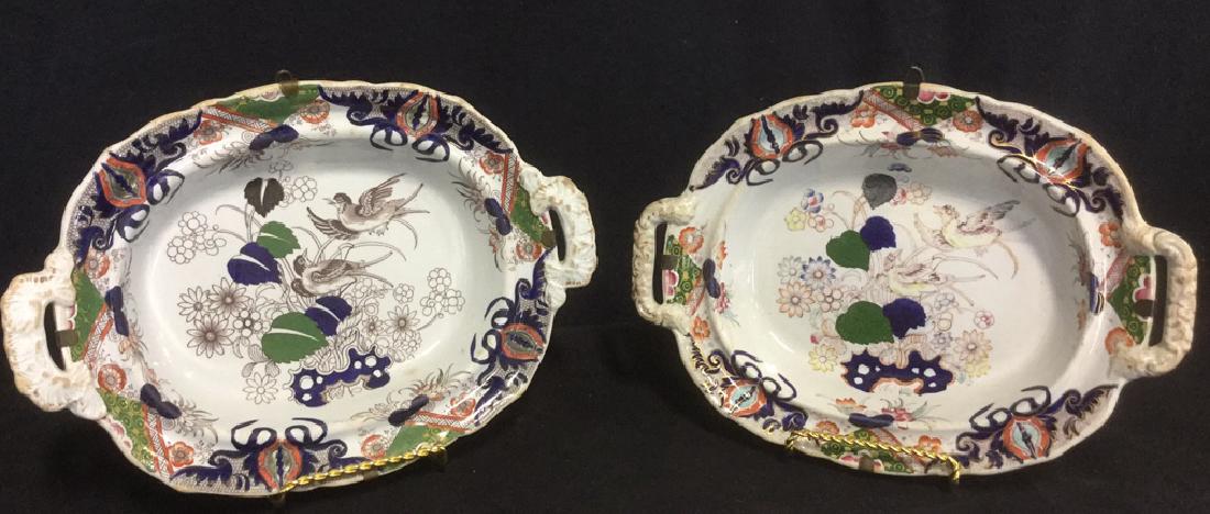 Pair Of Mason's Blue On Porcelain Chargers: Pair Of Mason's Blue On Porcelain Chargers with handles. Ironstone China. Antique Porcelain. Two double handled porcelain chargers with hand painted floral and bird motif. Both Marked on underside Mas