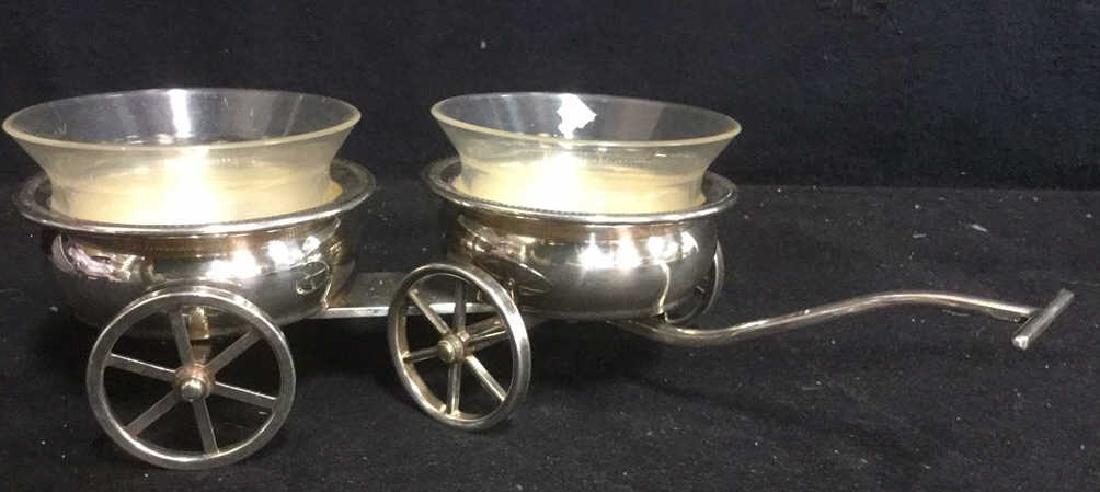 Silver Plate Wagon Style Double Condiment Set: silver plate table top accessory on large wagon wheels Display wine bottles, removable plastic bowls for condiments, pull toggle, length approximately 13 inches, ht approx 4 inches, marked underside R