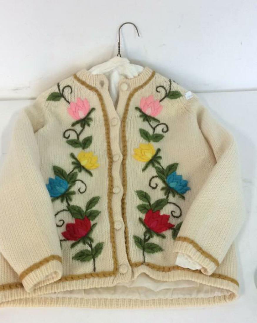 Vintage Knit and Embroidered Button Up Sweater: bright floral detailing, yarn threadwork on knit sweater, label reads Beauty Embroidery Company , kPO, made in Hong Kong, fits size small ladies