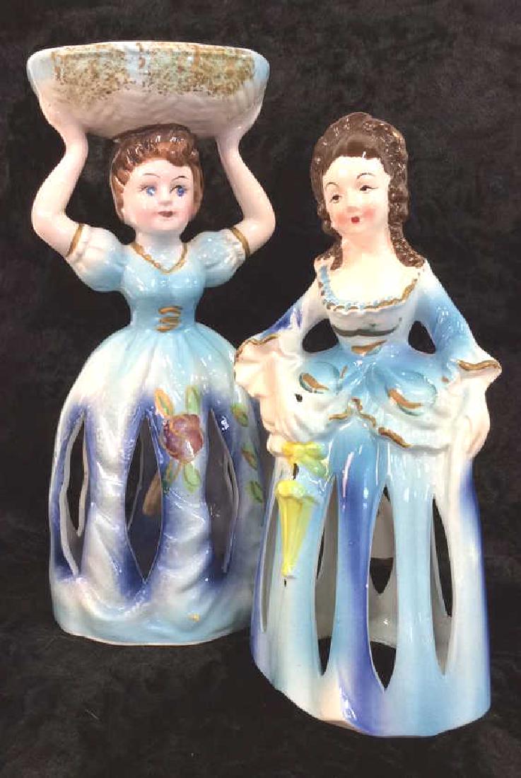 Pair Vintage Napkin Ladies: Pair Vintage Napkin Ladies. Painted porcelain with rhinestone details, lady figurine. Vintage napkin holder, women figural with slots in skirts to hold napkins. Some surface wear, missing rhinestones