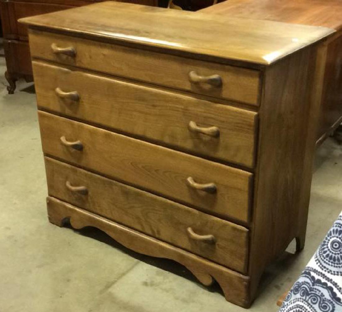 Vermont Made Wood Chest of Drawers: solid light toned wood carved apron carved wood handles, marked inside drawer for made in Vermont measures ht 35 inches, width 40 inches depth app 20 inches, dresser, chest of drawers, commode, storag