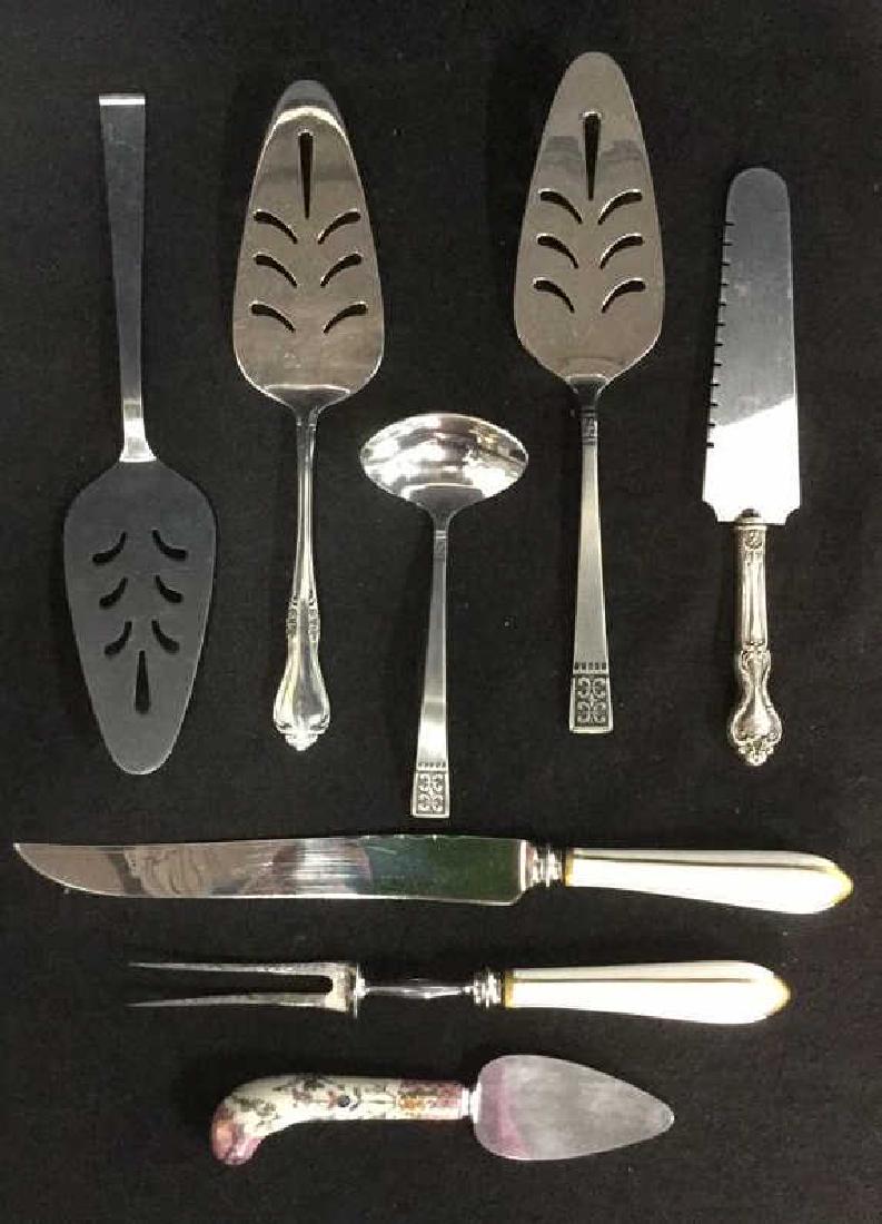 Lot 8 Mixed Serving Utensils Sterling Stainless: Lot 8 Mixed Serving Utensils Sterling, Stainless, and Porcelain handles. One carving set with white porcelain handles and gold toned painted vertical lines. Fork and knife of carving set is stainless