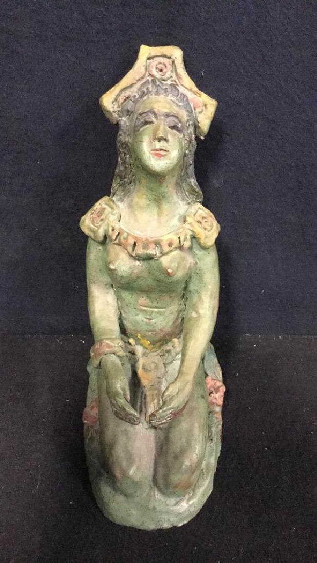 Nude Sculpture Of Central American Woman: Nude Sculpture Of Central American Woman. A ceramic sculpture of a kneeling woman possibly worshipping with long black hair, headdress, braided belt and jewelry. Painted in a a green glaze with red hi