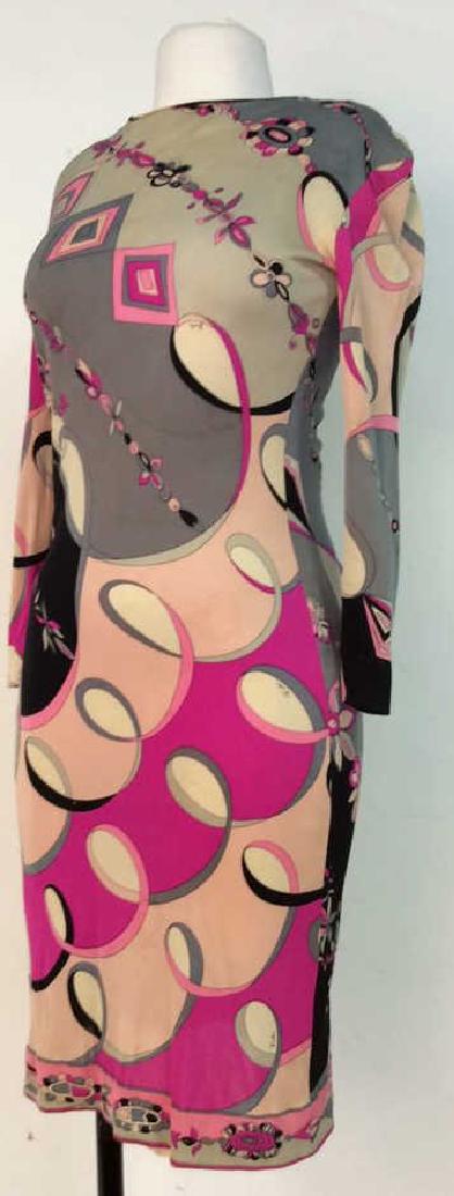 EMILIO PUCCI Vintage Silk Dress: EMILIO PUCCI Vintage Silk Dress. Size 10 with geometric multicolored floral design, tags read 100% pure silk and marked Made in Italy. Tagged as EMILIO PUCCI. Lightly stained from wear. Measures appro
