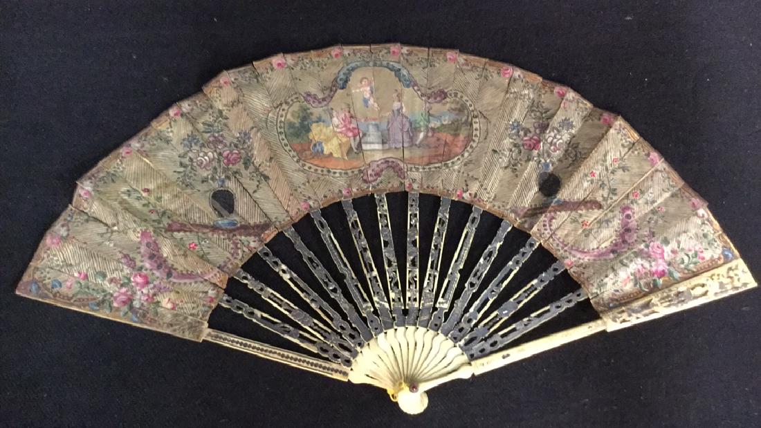 Antique Poss Louis XVI Ladies Fan: Poss Antique Ladies Fan W Painted Scene. Thought to be Louis XVI. Women's fan with carved openwork bone, possibly faux bone, body with intricate filigree and parchment possibly silk, fan with double s