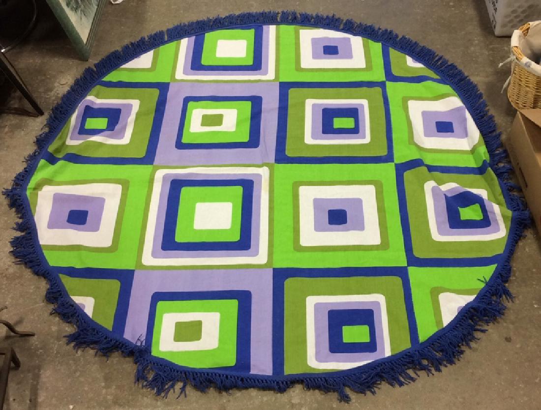 Mid Century Op Art Table Cloth C.1960 Panton Era: Piece contains tones of blue, green, white, lime, and periwinkle. Edges have fringes. Circa 1960. Mid century Op art table cloth. Measures approx 68 inches diameter.