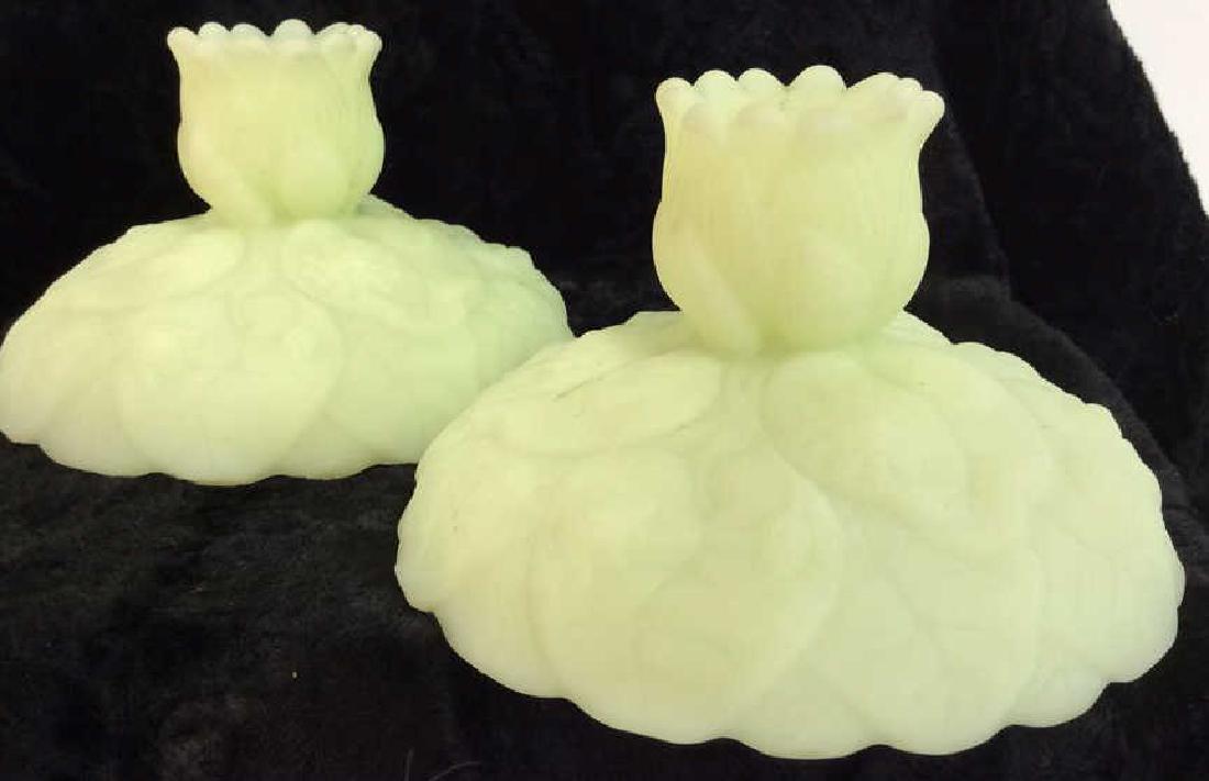 FENTON Hand Made Floral Design Candleholders: FENTON Hand Made Floral Design Candleholders. Mint green toned milk glass itch dimensional floral leaf details. Pieces have some minor surface wear. Measures approx 4 in tall by 5 in in diameter. Coll