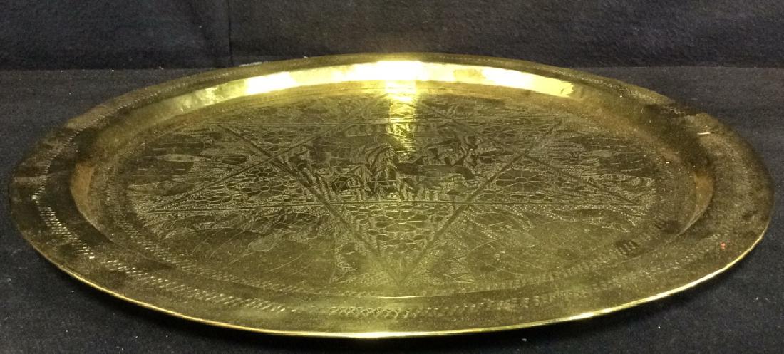 Gold Toned Metal Judaica Platter: Platter is intricately detailed. Piece has Star Of David Detail. Judaica Platter, Israeli arts and crafts, Platter is circular. Measures approx 16 inches diameter. Metal platter, gold toned platter, J