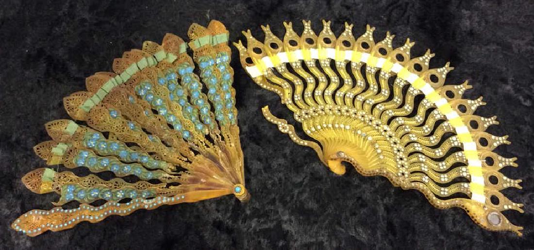 Pair Ladies Vintage/Antique Brisé Fan: Pair Ladies Vintage/Antique Brisé Fan. Opera size brisé fan. Faux shell body, possibly bakelite or celluloid. Pieces decorated with turquoise toned cabochon stone details, painted floral design, ope