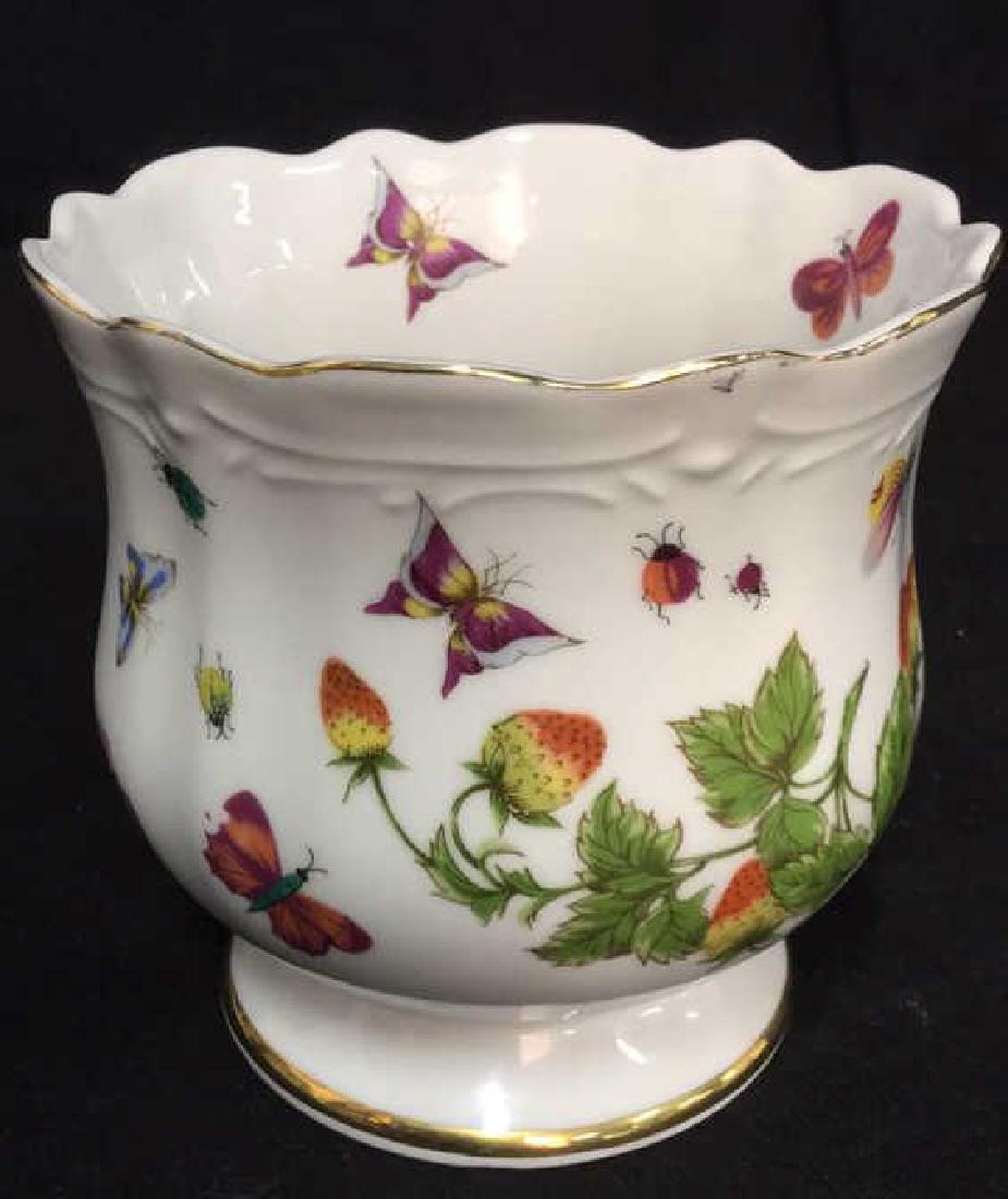 Porcelain Cache Pot Vessel Butterflies: footed pedestal style porcelain Cache Pot, vessel, decorative table top accessory, fine bone china, measures app 5.5 inches ht by 5.5 inches diameter, numbered underside in gold9919, designed with but