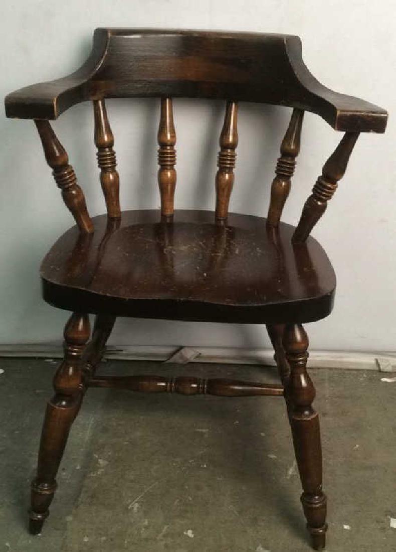 Vintage Carved Wooden Spindle Back Chair: Chair has carved wooden detail. Contains evident wear due to age. Possibly antique. Chair has thick carved, spindle like detail for backrest. shaped seat, splayed turned legs, Measures approx 30 inche