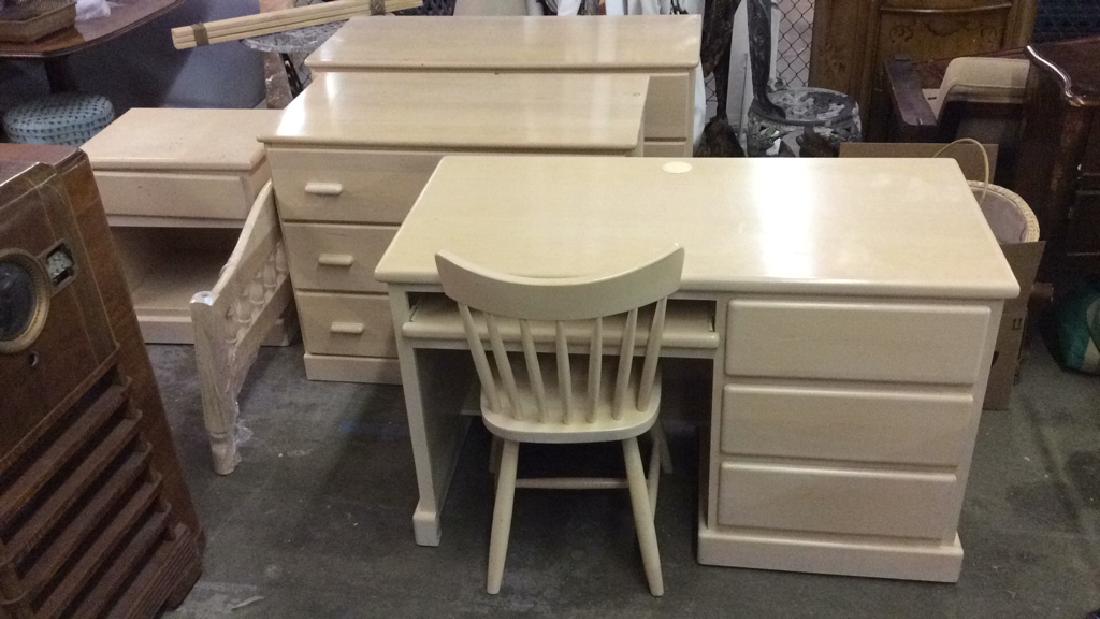 Lot 7 Wooden Bedroom Furniture Set: Lot includes desk with 3 drawers, 1 dresser with 3 drawers, 1 dresser with 6 drawers, 1 nightstand, 1 headboard and 1 footboard. Piece contains some stains. Dresser with 6 drawers measures approx 49 i