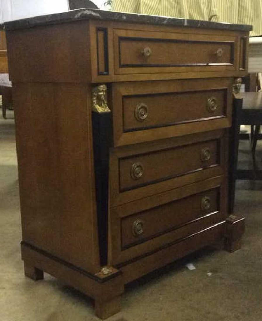 Empire Style vintage marble top Commode dresser: vintage marble top dresser, marble top not attached, wooden base, black toned lining, gold toned human head figural, ornately detailed knobs gold toned. Empire and Biedermeir styling, black marble top