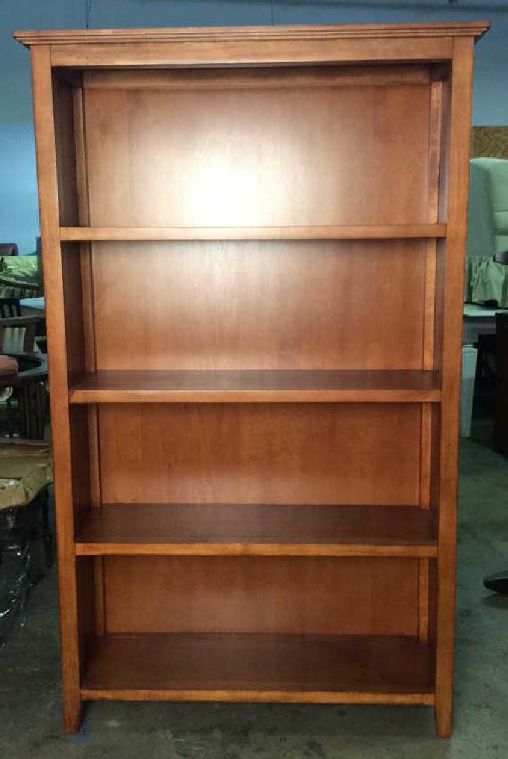 Light Brown Toned Wooden Bookshelf: light brown wooden toned book shelf, minor scuffs, good condition , wooden bookshelf, bookshelf. Measures 13.5 inches deep, 42 inches wide, 67 inches tall