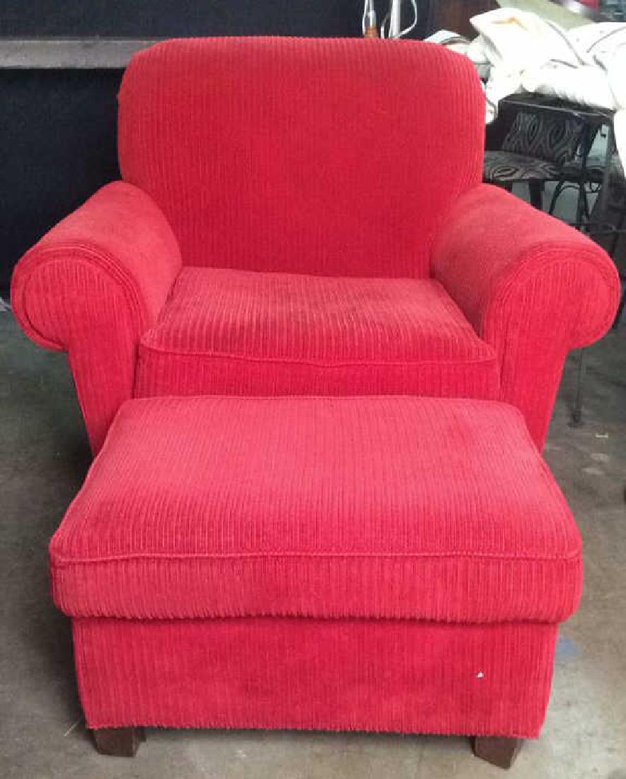 Lot 2 NORWALK FURNITURE Armchair & Ottoman, USA: Hand Crafted in USA, Armchair and ottoman are red toned. Couch seat cushion is loose. contains wooden feet. Measures approx 33 inches deep 39 inches wide, 34 inches tall. Tag reads NORWALK FURNITURE. 