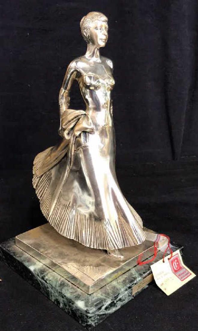 Sterling Silver Clad Lady Etruria, Italy: Lady figural Sculpture, art work, clad in Sterling Silver, brass plaque ar front I’l Mito America, Anni Cinquanta Opera N 24/299, original label on string reads ETRURIA, rate in Argento, 1889 c, and