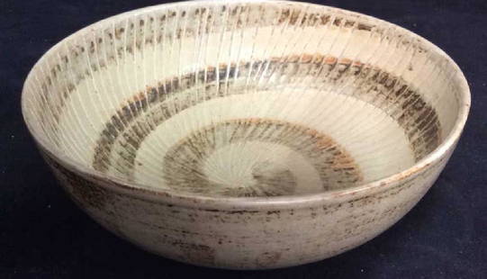 GERD BOGELUND Signed Royal Copenhagen Bowl: measures ht 4 inches diameter app 10 inches, circa 1950’s, Scandinavian, mid century modern stoneware, ceramic bowl in pinwheel pattern, beige and earth tones, artist signed with hallmark also marke