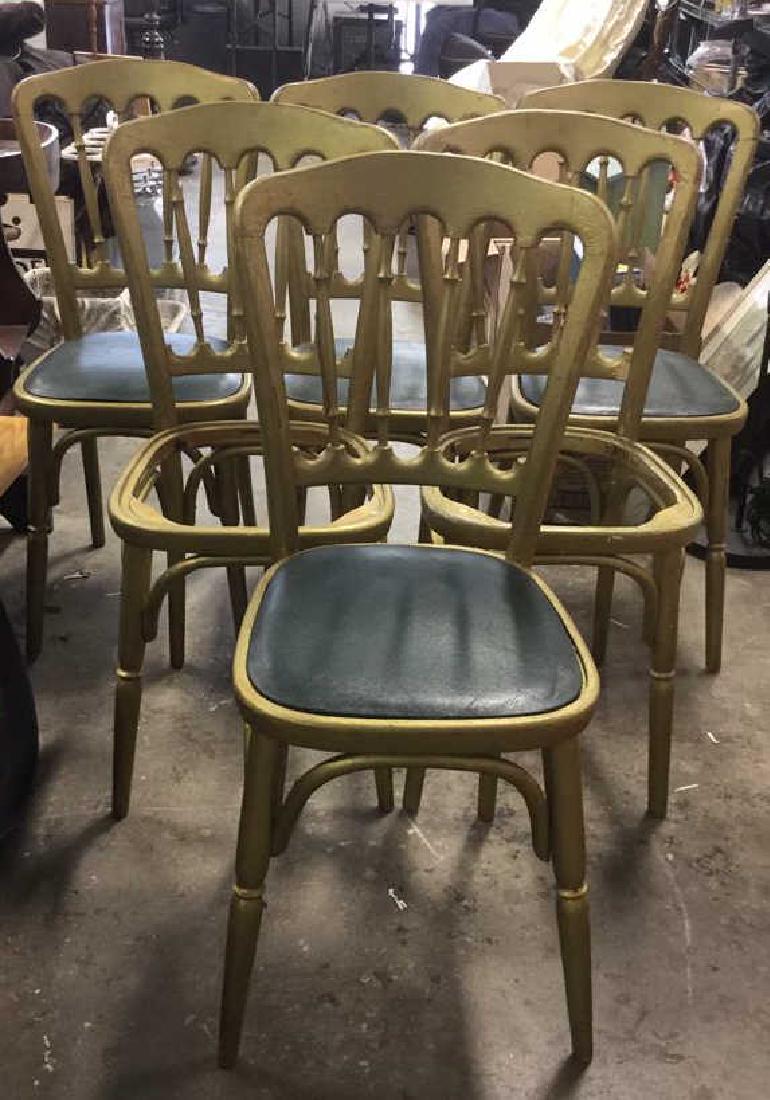 6 GRAISON Gold Toned Carved Wooden Chairs: Lot Includes 6 gold toned wooden chairs. Seat cushions appear to be leather and are dark green toned. Lot includes 4 cushions. Seat cushions are removable. Contains spindle back like backrest. Marked
