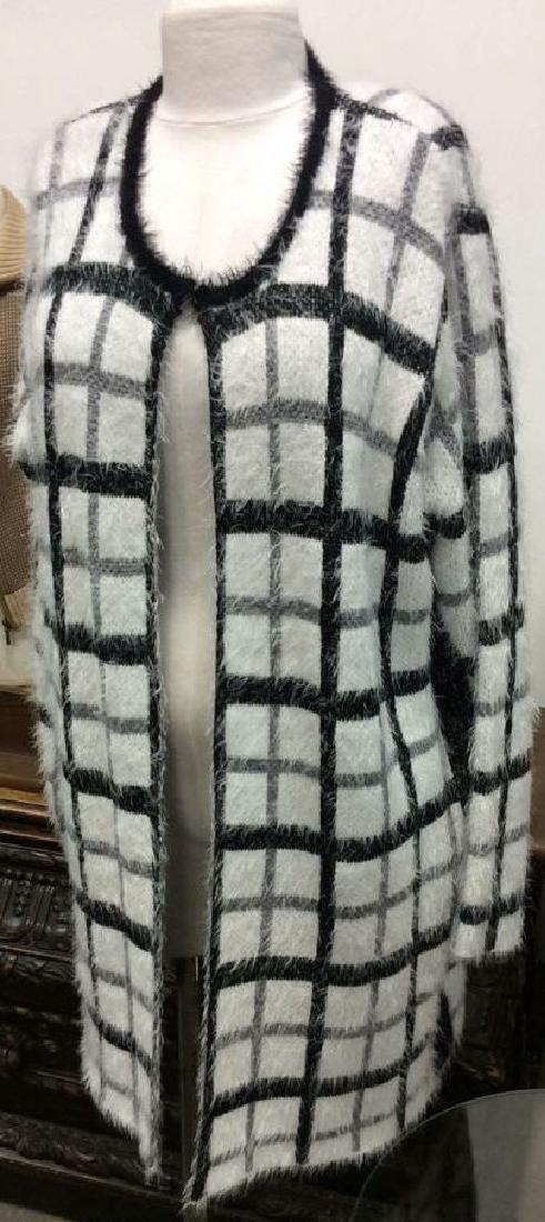 Nylon and Acrylic Full Length Plaid Sweater: White and Black plaid toned full length sweater. Sweater is 55% Acrylic and 45% Nylon. Good condition. Black collar. 16 inches wide, 35 inches long.
