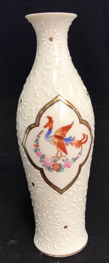 Noritake Textured Painted Porcelain Vase: With blue and burnt orange toned painted plumed bird in gold painted center medallion, measures ht app 9 inches, good condition, marked as hand painted, marked Japan