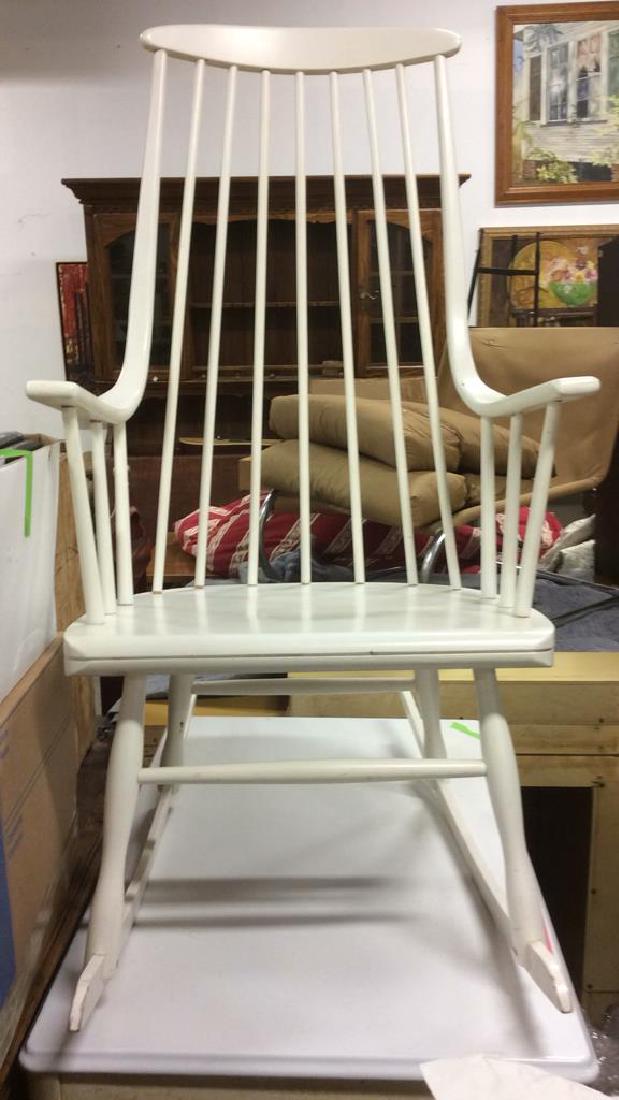 Vintage White Toned Wooden Rocking Chair: Chair has a spindle back is white toned and wooden. Contains some paint wear. Measures approx 46 inches tall 35 inches deep, 24 inches wide. Rocking chair, arm chair, property of scarsdale, new york e