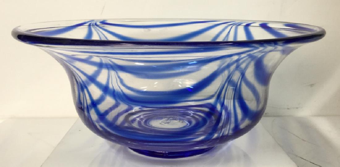Metropolitan Museum Of Art Glass Bowl: Metropolitan Museum of Art Glass Bowl with Cobalt Blue Pulled Drape Signed "M". Studio Art Glass. Hand formed glass bowl with blue design. A capital letter M is etched on underside of bowl. No conditi