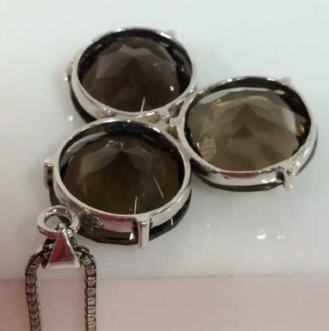 Mid Century Sterling W Smoky Quartz Necklace: Mid Century Sterling W Smoky Quartz Necklace. Three round brilliant cut smokey quartz gems with sterling silver. Pendant on chain, women’s vintage estate jewelry. possibly Scandinavian. Mark on pend