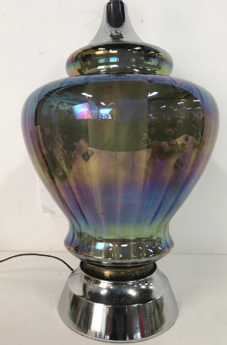 Mid Century Op Art Glass Chrome Lamp C.1970: Mid Century Op Art Glass Chrome Lamp C.1970. Verner Patton era. Lamp appears to have bulb socket inside body of lamp. Lamp body resembles carnival glass with pearlescent tones. Measures approx 33 inch