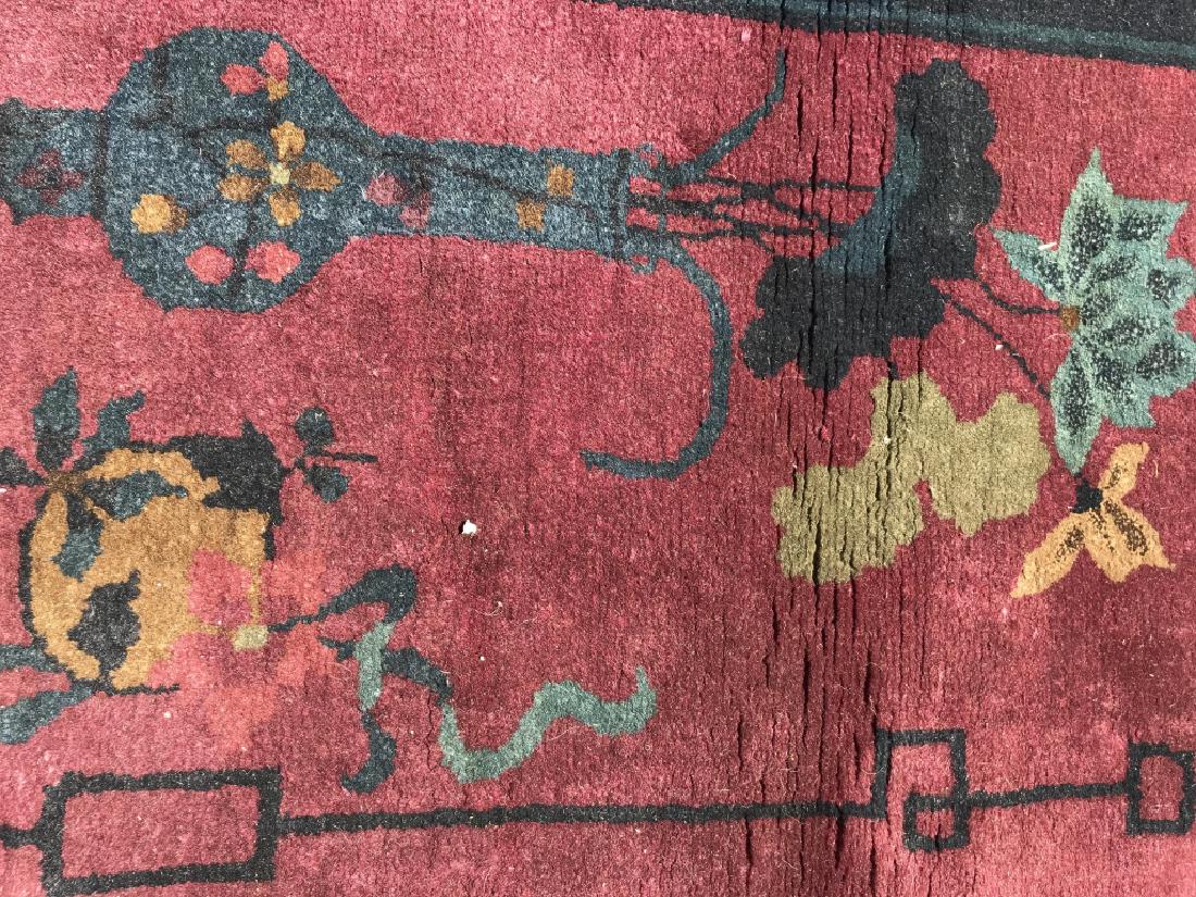 Handmade Antique Chinese Art Deco Wool Rug: rug is handmade. Contains tones of cranberry, brow, navy, and olive. Contains floral and vase detail. contains some tears around edges. Measures approx 52 inches long 31 inches wide. Oriental Carpet, 