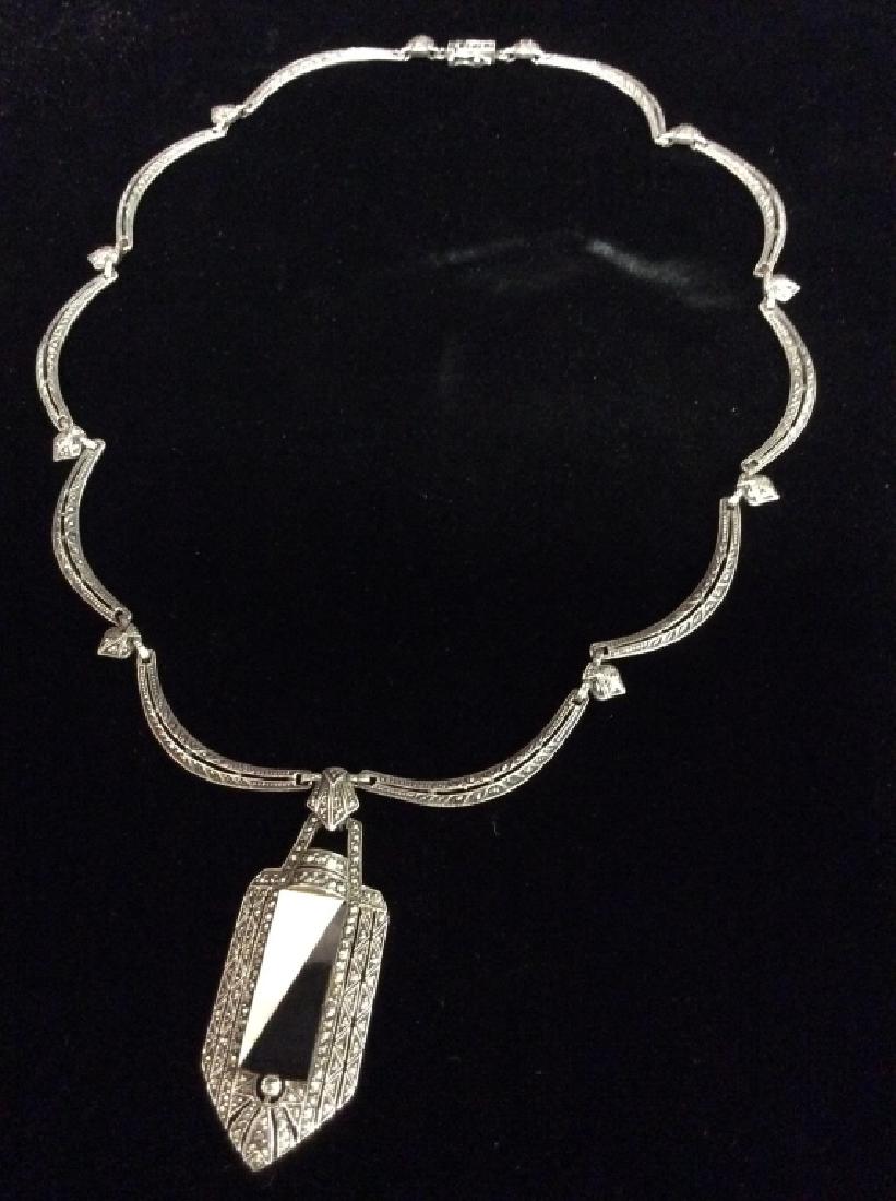 Art Deco 1930s Sterling Marcasite Necklace: Art Deco, Sterling Silver, Marcasite, Pos Onyx and mother of pearl necklace C1930Â’s. An Art Deco sterling marcasite and filigree link necklace with pendant of marcasite, mother of pearl and possib