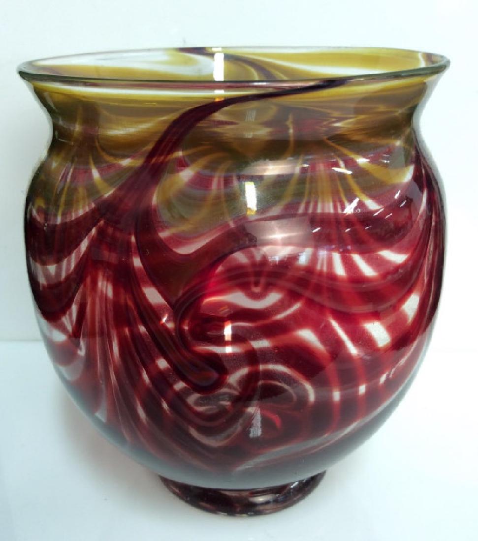 Signed Studio Art Glass Vase: Signed Studio Art Glass. Low footed vase, clear glass with red and yellow toned swirl design. Signed illegibly, possibly signed Fruman 4/80. Vintage art glass, c 80s. Good condition. Measures approx 4