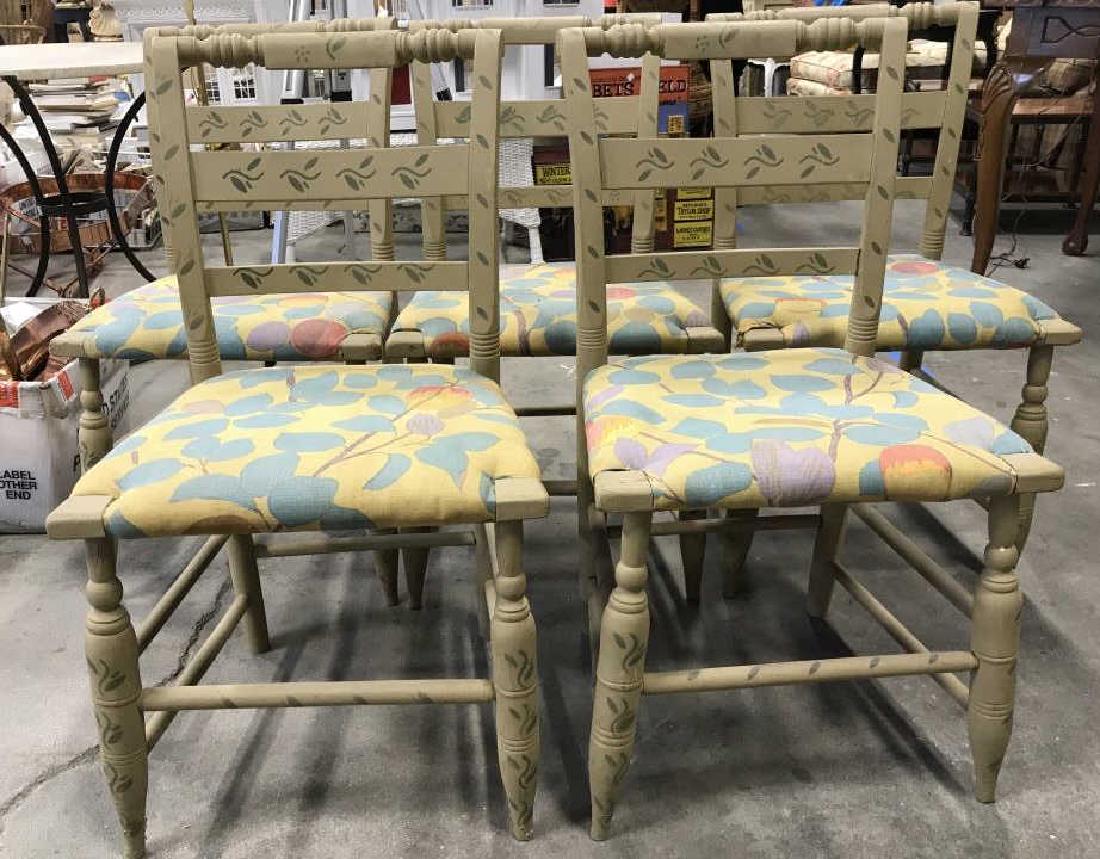 Set 5 Carved Wood Painted Side Chairs: Chairs have carved wooden detail. Also contain floral, vine, and leaf detail hand painted. Upholstery on seats are yellow, blue, pink, and purple toned with leaf detail. Measures approx 31 inches tall