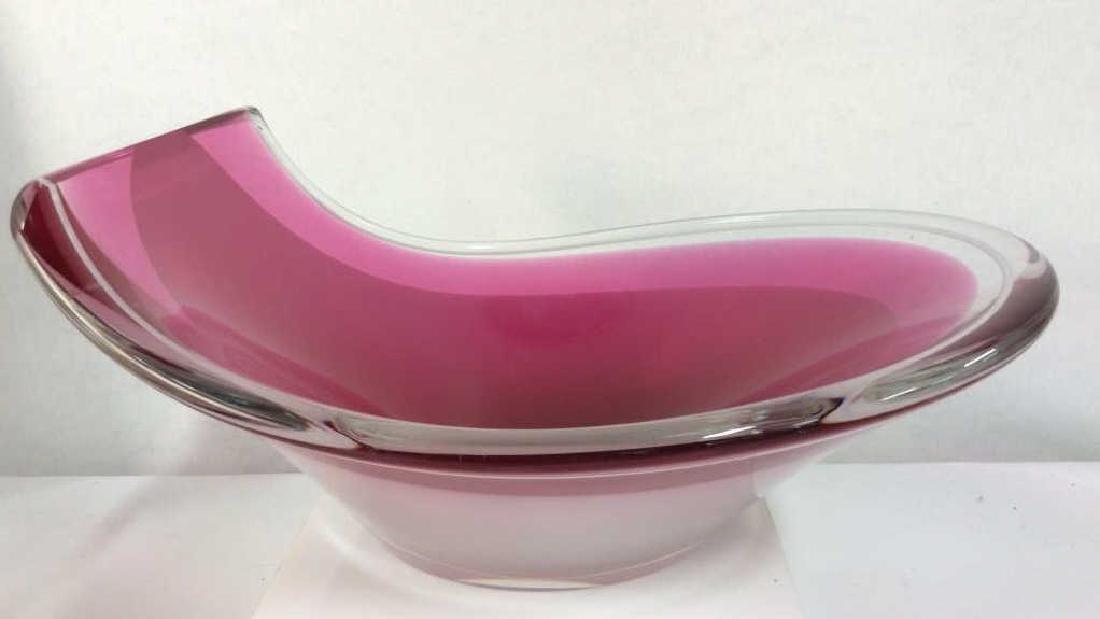 FLYGSFORS Scandinavian Signed Art Glass Bowl: FLYGSFORS Scandinavian Signed Art Glass Bowl. Art glass bowl, display decorative bowl, two toned pink art glass with colorless glass rim. Unique rim shape. Some minor surface wear. Signed on underside