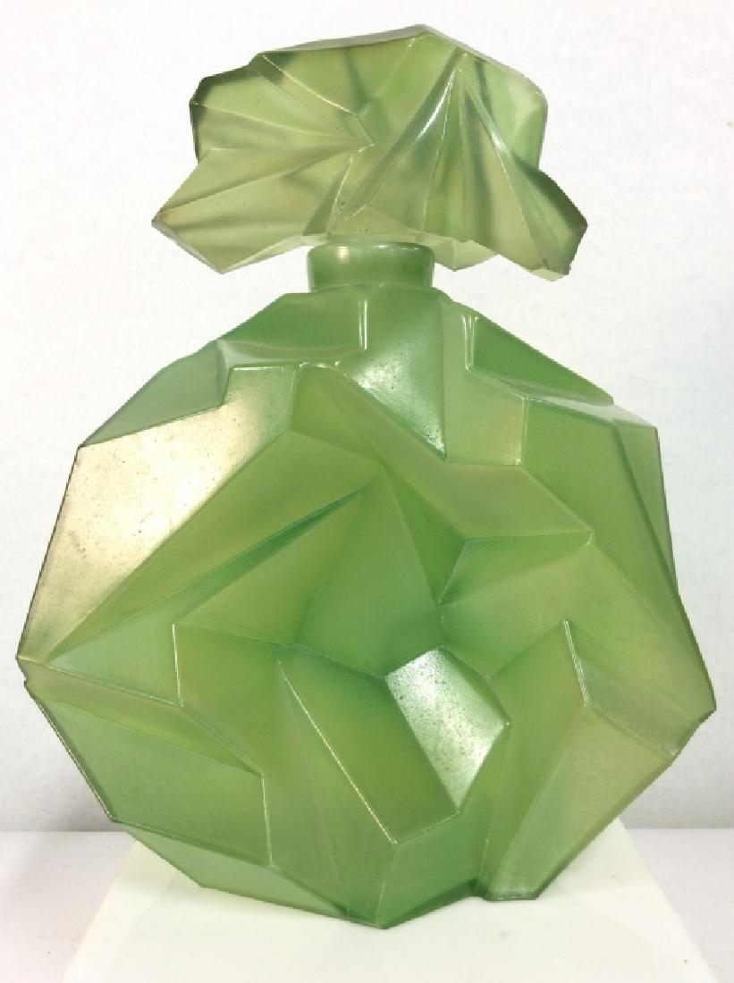 Cubist Art Glass Bottle With Stopper: Cubist Art Glass Bottle With Stopper. Frosted green toned art glass, cubist style art glass. Handcrafted, unique asymmetrical angular form. Some chips and cracks, will no longer hold liquid, decor pie