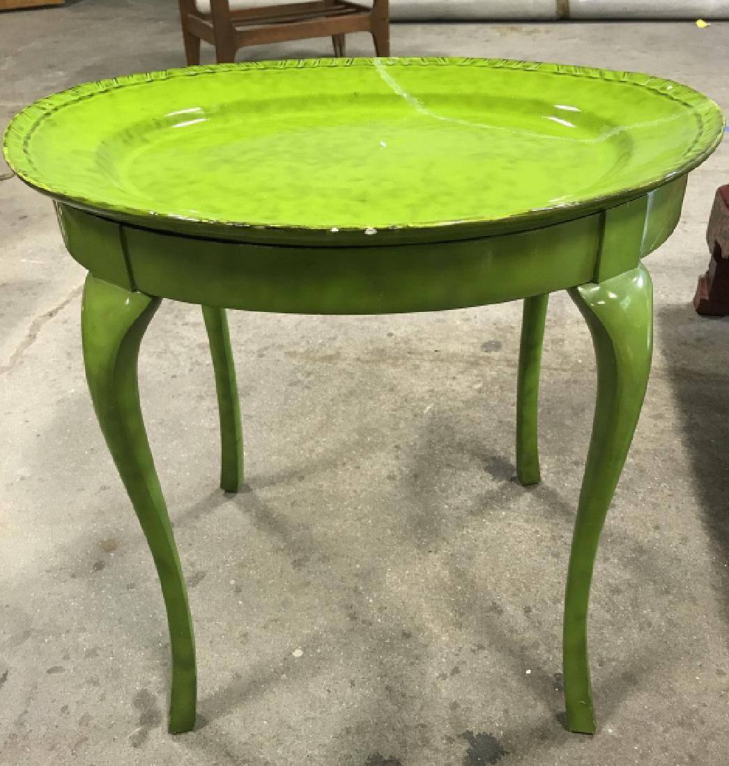 Green Toned Wood & Ceramic Tea Table: Table frame & legs are wooden. Table top is ceramic & oval toned. Vibrant lime green glaze, Table top Appears to have been repaired. Measures approx 21 inches tall & long 17 inches deep. Property of B