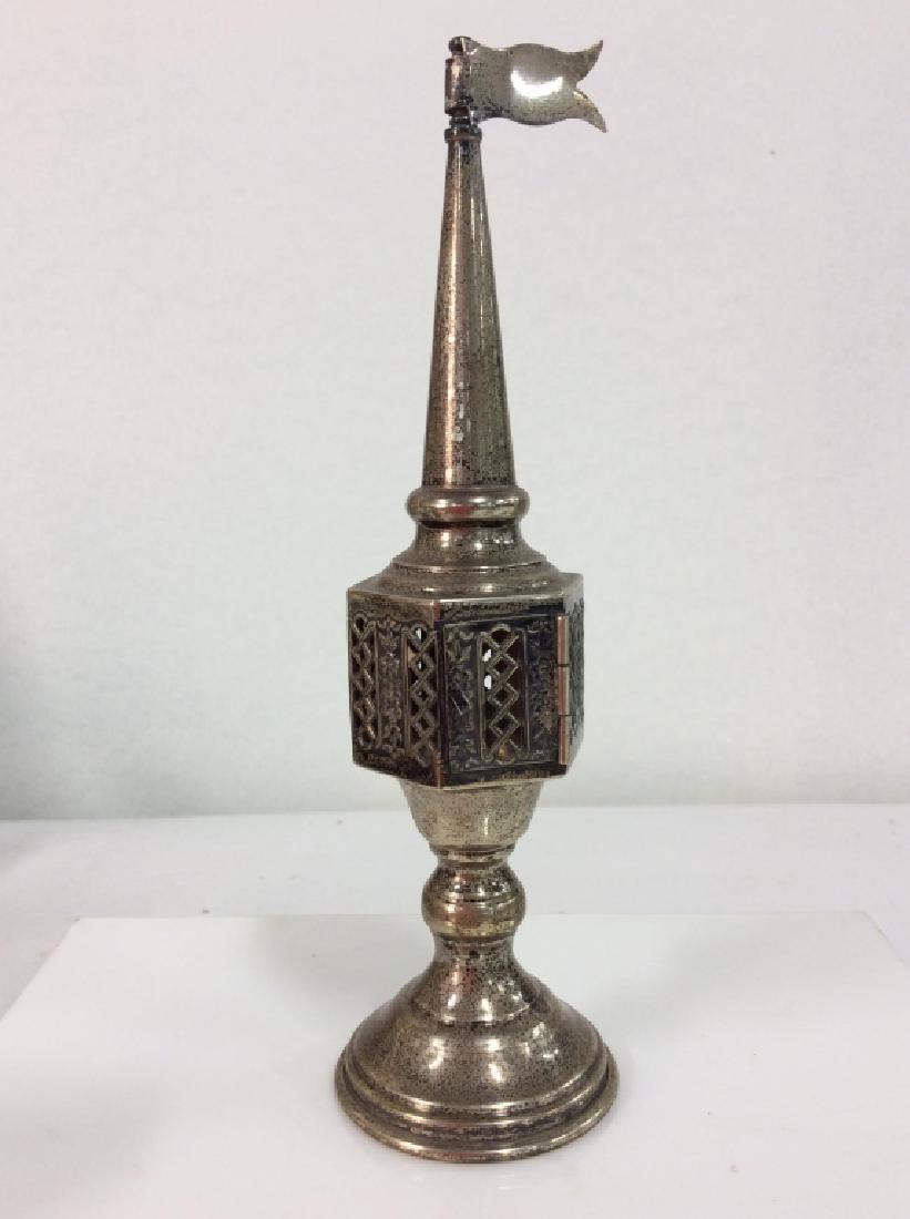 Sterling Silver Incense Burner Vessel: Vintage Sterling Silver Incense Burner Vessel. Censor, Open work center with raised floral design motif, pedestal and spire top with flag design. Some discoloration. Measures approx 8 in tall by 2 in 