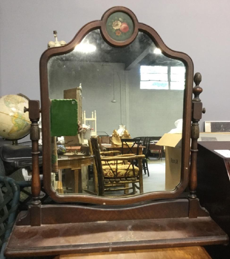 Vintage Wooden Swing Flip Table Mirror: Vintage, possibly antique vantiy mirror, dresser top mirror, tiltable mirror on stand, brown toned wooden swinging table mirror is designed with a curved top. The circular top is designed with painted
