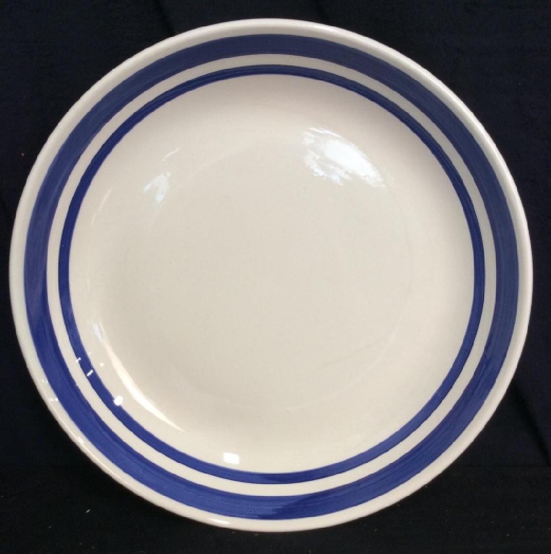 STOVIGLIERIE Handpainted Italian Centerpiece: STOVIGLIERIE Handpainted Italian Centerpiece. White toned porcelain with blue toned painted double rim design. Some minor surface wear including minor crazing. Italian Porcelain, Tableware, Centerpiec