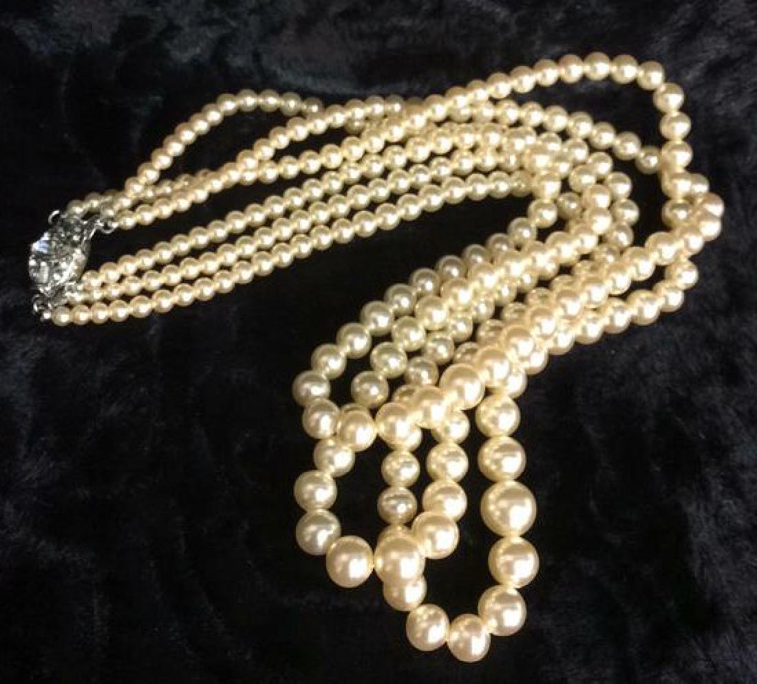 TRIFARI Pearl and Sterling Necklace.: TRIFARI Pearl and Sterling Necklace. Possibly natural pearls, possibly faux. Some minor surface wear. Measures approx 9 in long. Women’s vintage designer estate jewelry.
