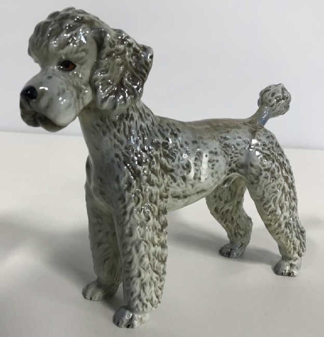 GOEBEL PorcelainPoodle Figural: Poodle, dog figure marked for GOEBEL, West Germany. Measures ht 7 inches length app 8 inches, property of Palm. Each, Florida Estate, good condition