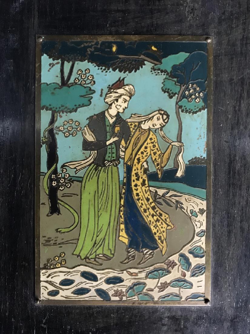 Painted Pos Turkish Artwork On Metal: Painted Pos Turkish Artwork On Metal And mounted on wood. A brass toned metal plaque with an etched scene of a man and woman in traditional robes and head dress. Metal appears to be hand painted. Some