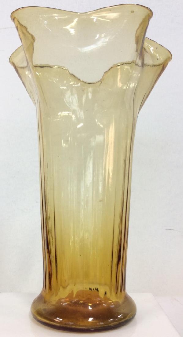 Yellow Toned Glass Vase: Yellow Toned Glass Vase. Yellow toned glass vase with crimped edge and heavy base. Appears to be in good condition. Will need cleaning. Measures approx 12 in tall by 8 in in diameter. Art Glass, vase,