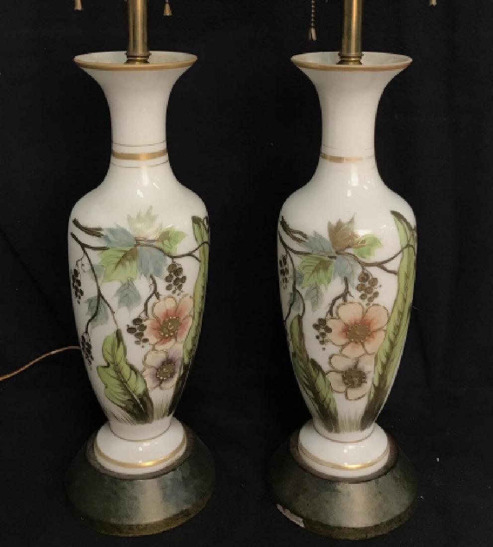 Pair Of Hand Painted Opaline Urn Lamps: Vintage Pair Of Hand Painted Opaline Urn Lamps w brass toned metal hardware and faux stone bases. Vintage home decor. Vintage Lighting. Opaline bedside lamps. Two opaline vessels with hand painted flo