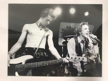 Johnny Rotten & Sid Vicious B&W Photograph Print: Framed and Matted Johnny Rotten & Sid Vicious from the band Sex Pistols B&W Photographic Print. The Sex Pistols were an English punk rock band that formed in London in 1975. They were responsible for