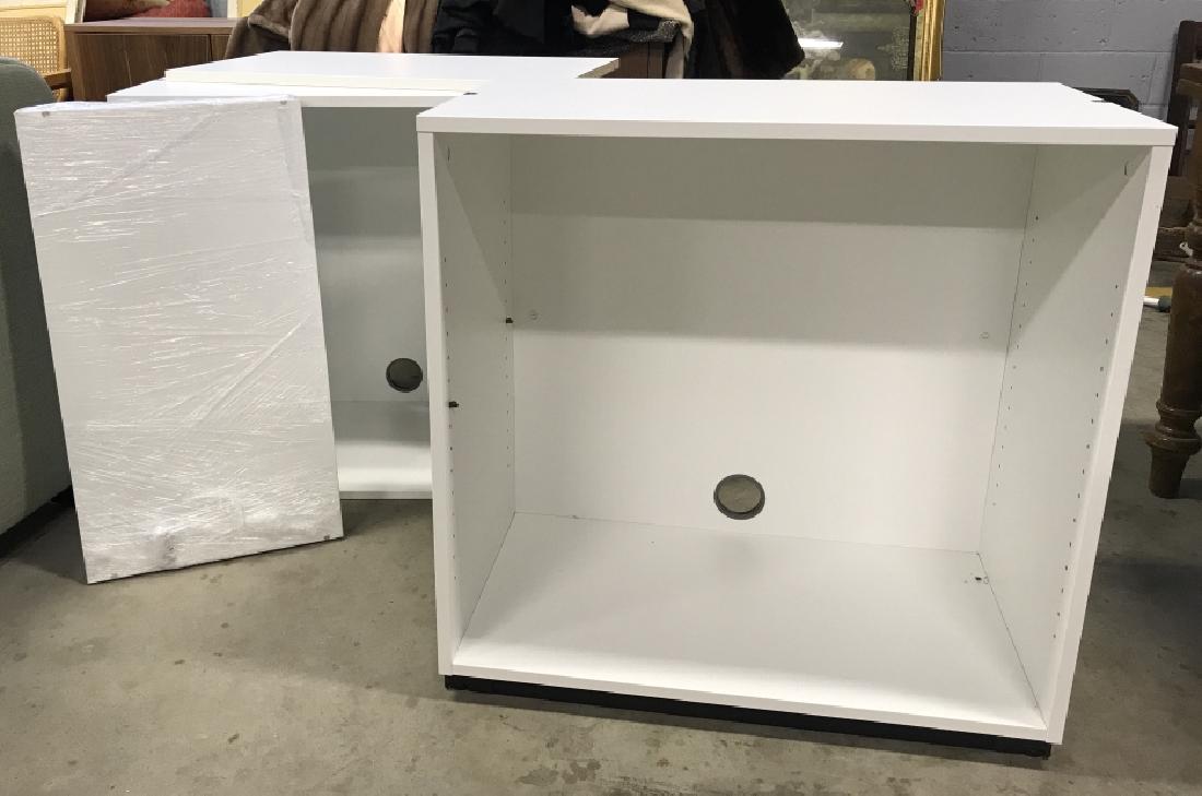 Pair Of White Adjustable Bookcases: Pair Of White Adjustable Bookcases. Each bookcase comes with two shelves and hole in back for wire exit. Possibly from Ikea. Missing metal hardware that shelves rest on. Home Office Decor. Contemporar
